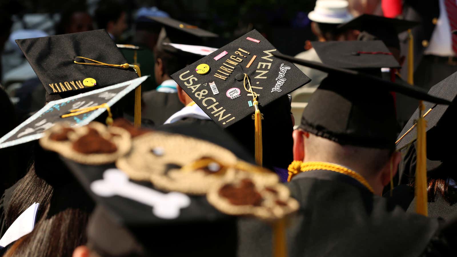 An adorned graduation cap saying, “USA and CHN” at The City College of New York commencement ceremony in Manhattan on May 31, 2019. REUTERS/Gabriela Bhaskar…