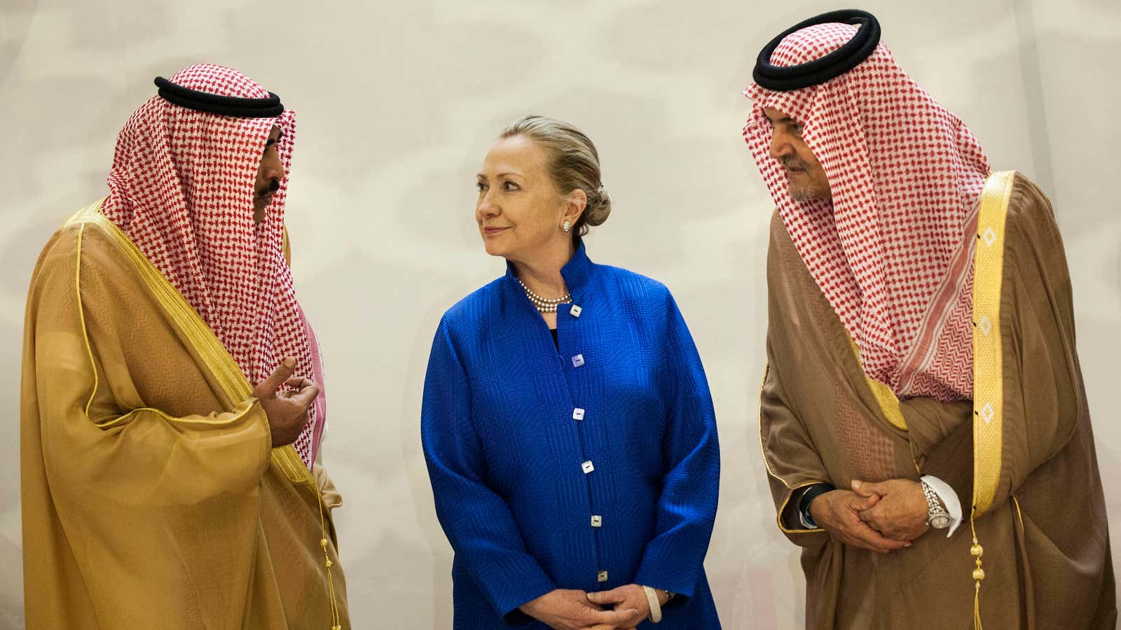 Saudi foreign minister Prince Saud al-Faisal, right, US secretary of state Hillary Clinton and Kuwaiti foreign minister Sheikh Sabah Khaled al-Hamad al-Sabah chat prior to a group photo before a US-Gulf Cooperation Council forum at the Gulf Cooperation Council Secretariat in Riyadh, Saudi Arabia, Mar. 2012.