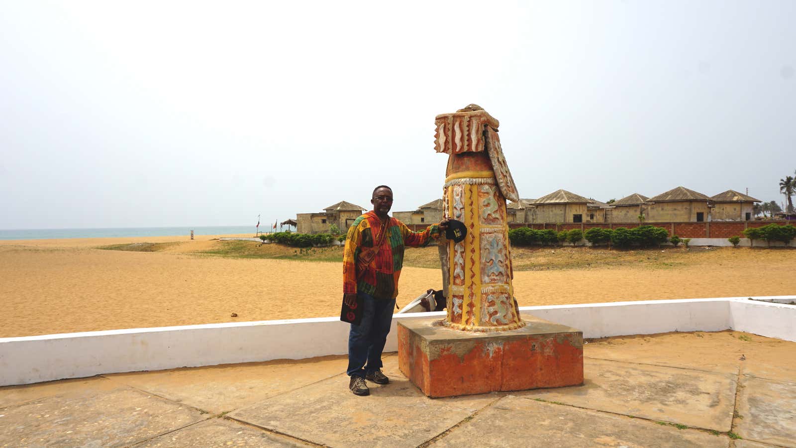 “Cosmo Kenton a Prince Hall Mason from North Carolina near a sculpture at The Port of No Return in Ouidah.”