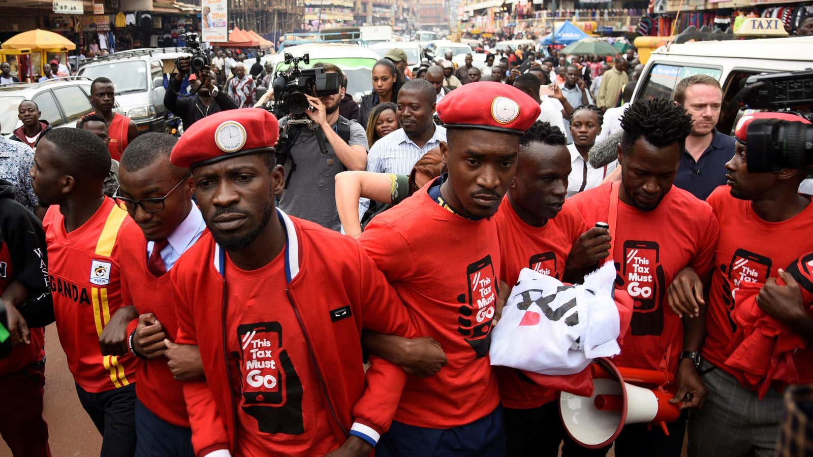 Ugandan musician turned politician, Robert Kyagulanyi (Bobi Wine), leads activists during a demonstration against the social media tax on July 11.