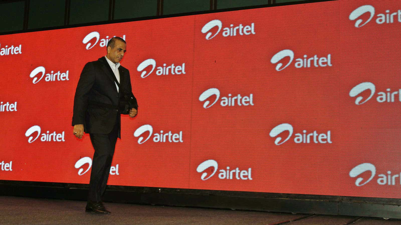 Chairman and Managing Director of Bharti Airtel Ltd. Sunil Mittal walks as he attends a press conference during the launch of Airtel’s 4G services, in…