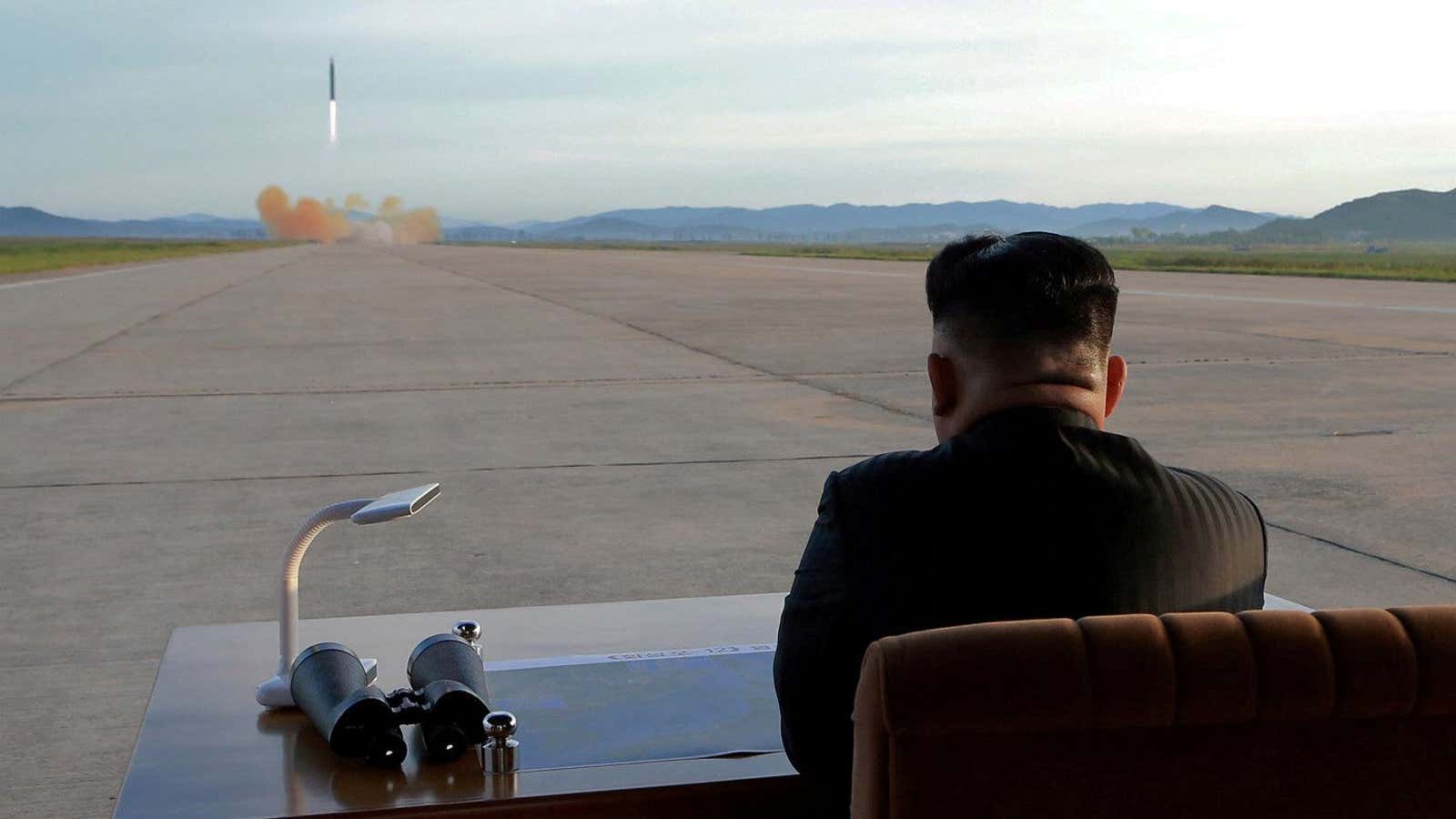 North Korean leader Kim Jong Un watches the launch of a Hwasong-12 missile in this undated photo released by North Korea’s Korean Central News Agency…