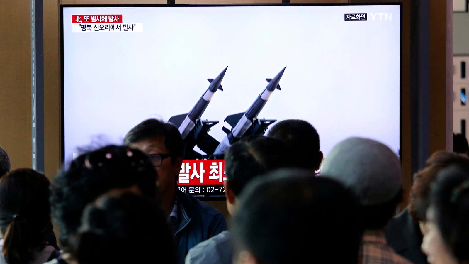 A South Korean news broadcast shows missiles used by North Korea.
