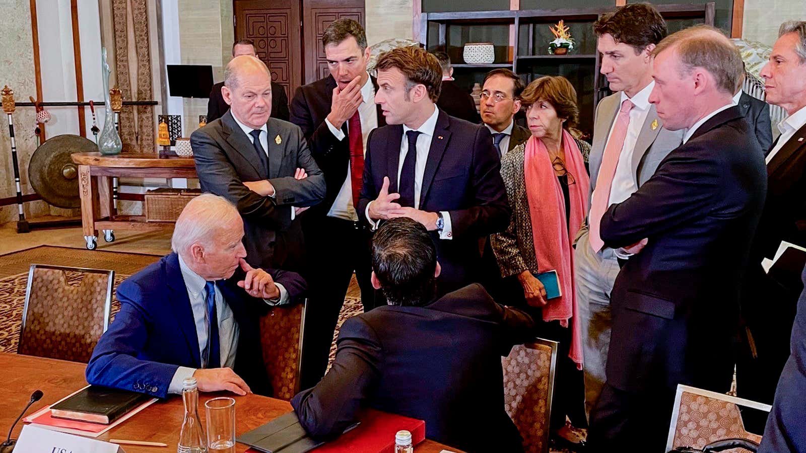 (L-R) US President Joe Biden, German Chancellor Olaf Scholz, Spanish Prime Minister Pedro Sanchez, French President Emmanuel Macron, British Prime Minister Rishi Sunak, Spanish Foreign Minister JosÃ© Manuel Albares Bueno, French Foreign Minister Catherine Colonna, Canadian Prime Minister Justin Trudeau, and US Foreign Minister Antony Blinken (R) talk about the missile strike in Poland as the G20 meetings take place on November 16, 2022 in Nusa Dua, Indonesia.