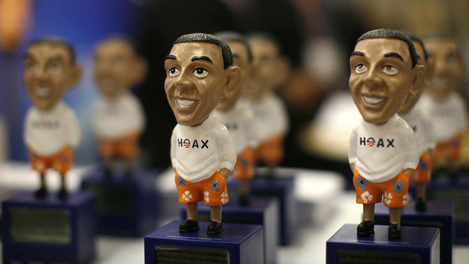Figures of President Barack Obama with the word “Hoax” are on display at the Conservative Political Action conference (CPAC) in Washington February 10, 2011. REUTERS/Kevin…