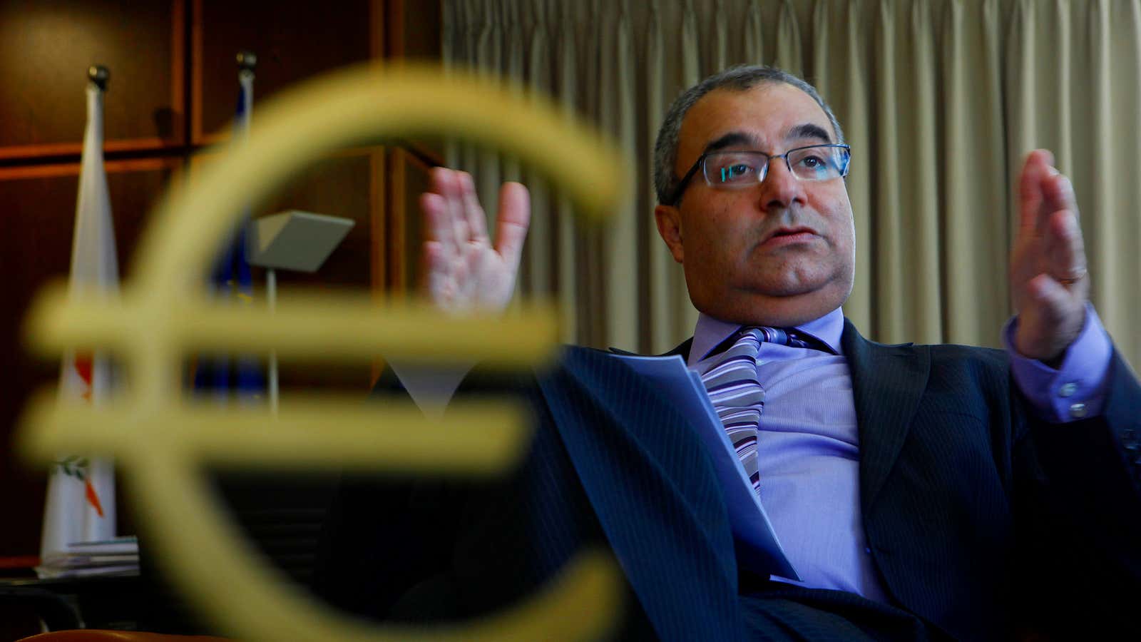The head of Cyprus’ Central Bank discusses the size of a potential bail-out.