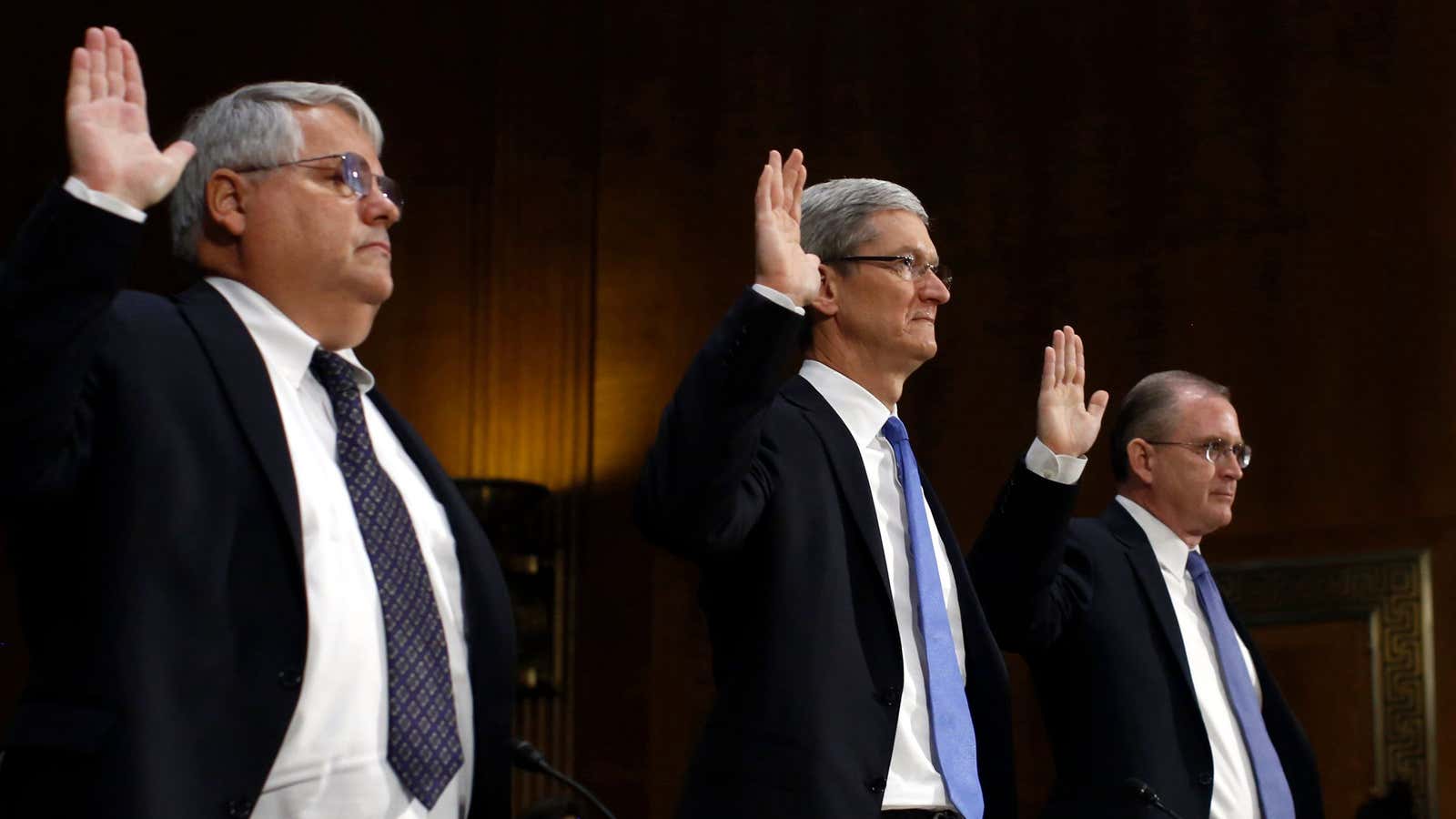 Apple execs, including former CFO Peter Oppenheimer (left), know all about the “detrimental impact on reputation” of their tax plans.