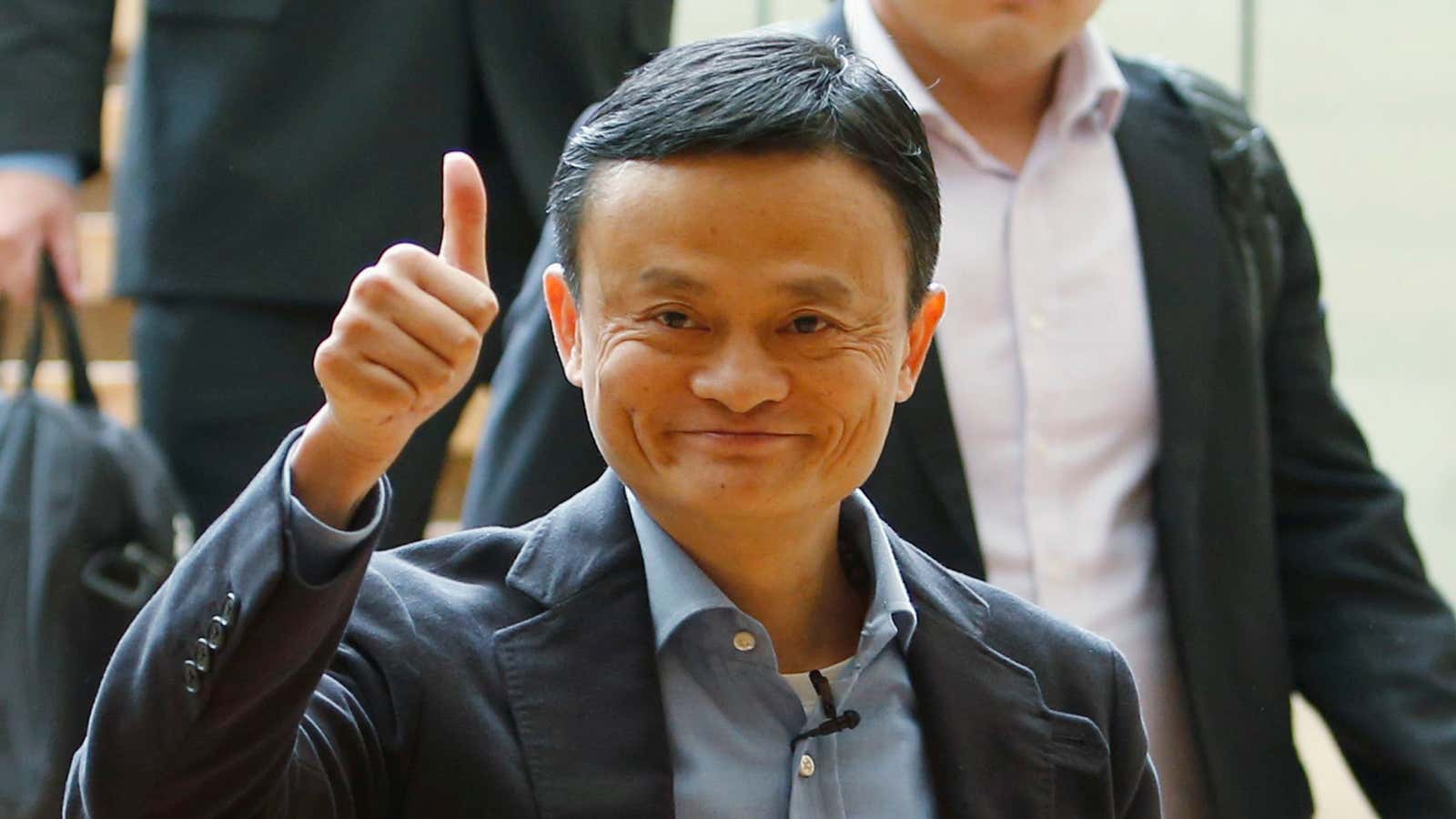 Alibaba founder Jack Ma gives a thumbs up to free markets.
