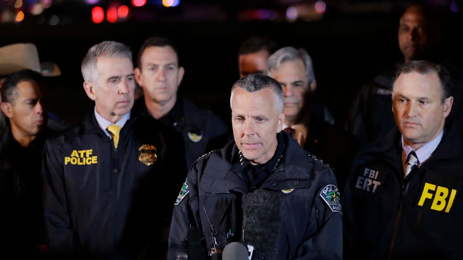 Austin Police Chief Brian Manley (center) said it was “a long three weeks.”