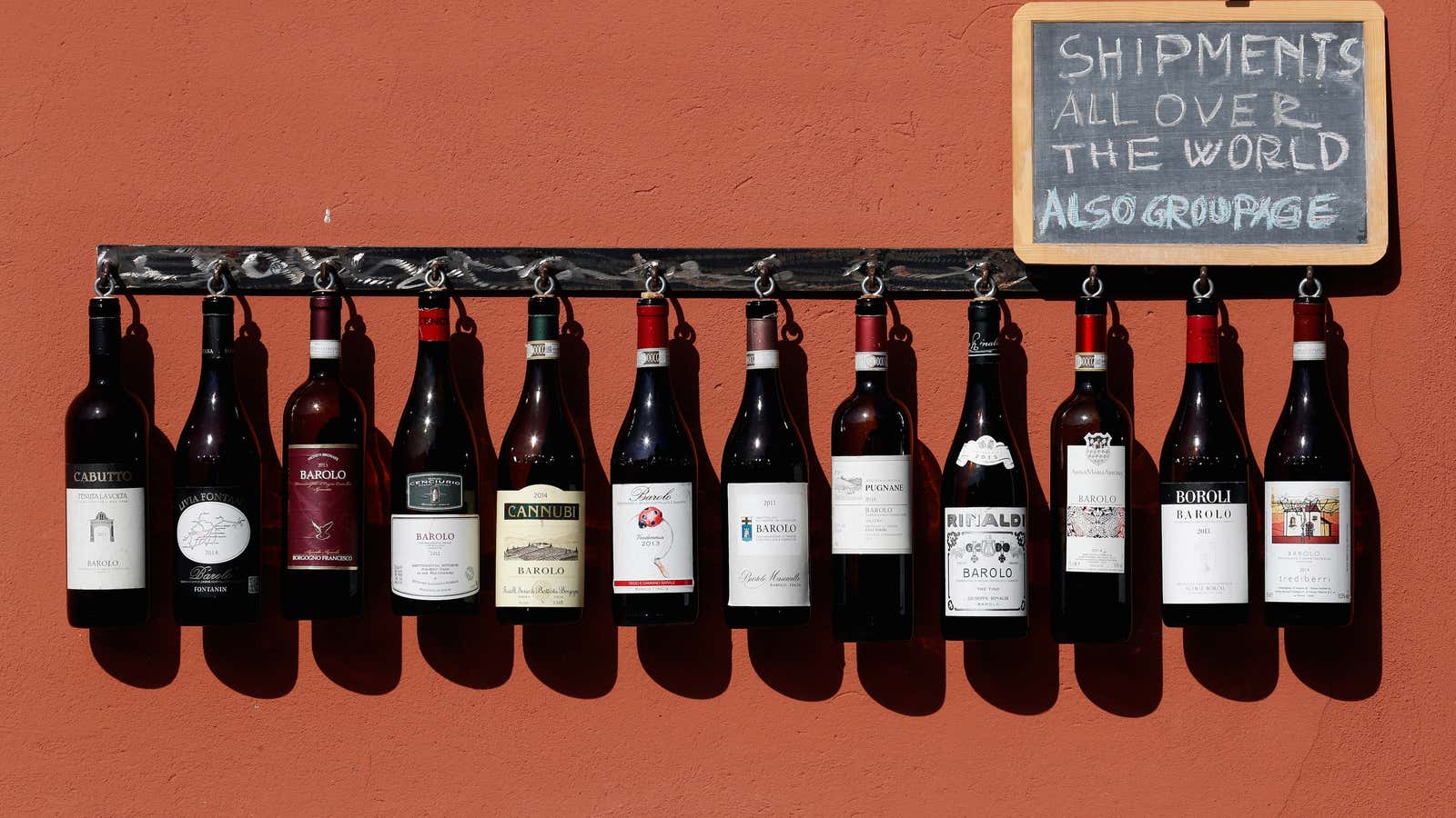 Wine bottles are displayed outside a wine shop in Barolo, Italy, October 19, 2018.