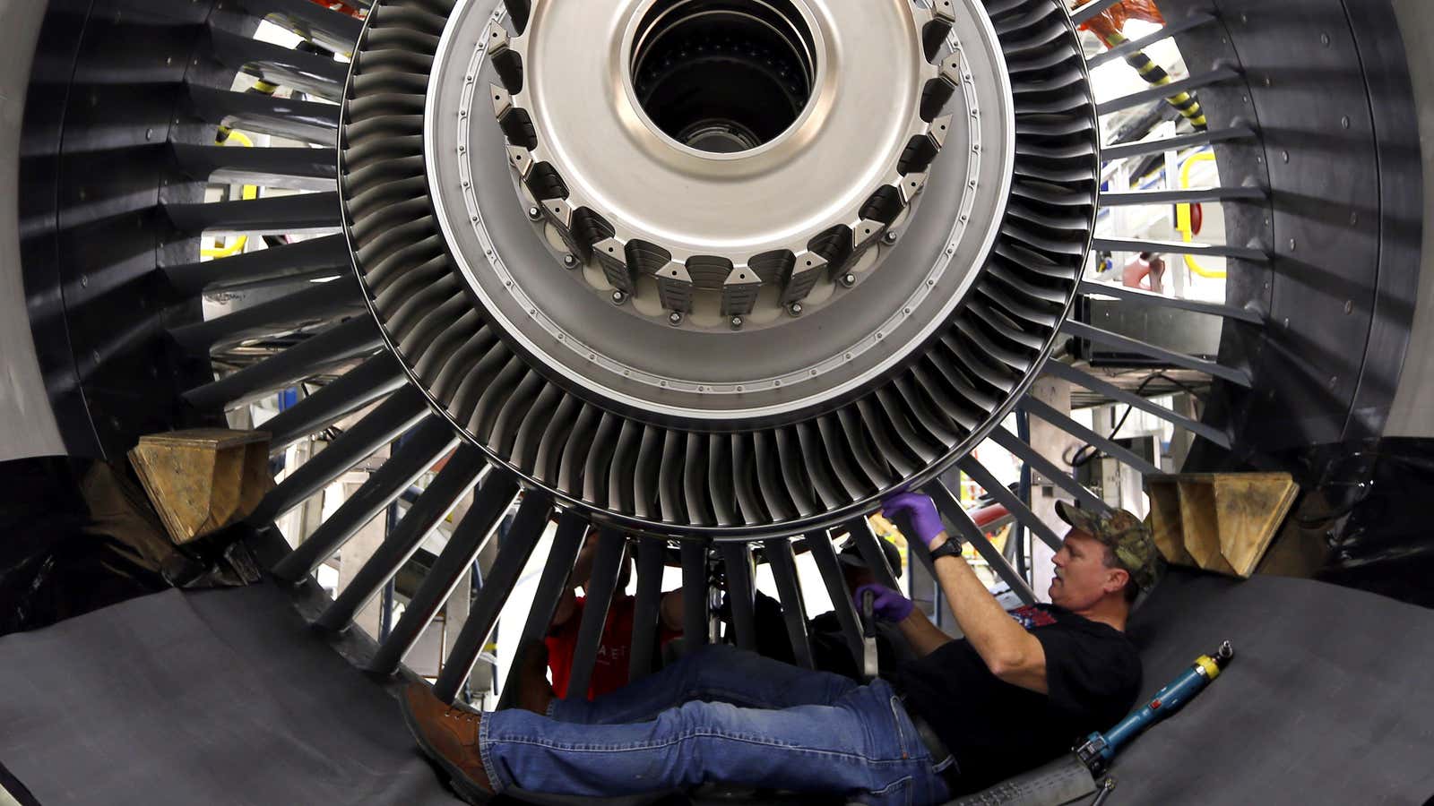 A GE Aviation employee builds an engine in Ohio.