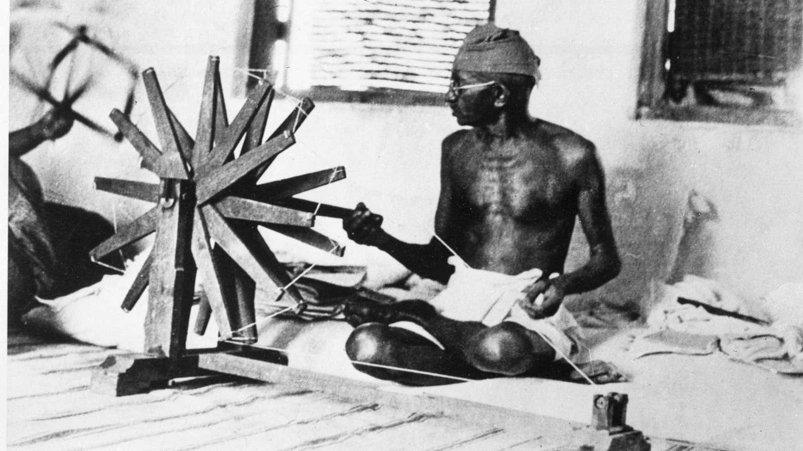 Mahatma Gandhi with the charkha—a symbol of independence.