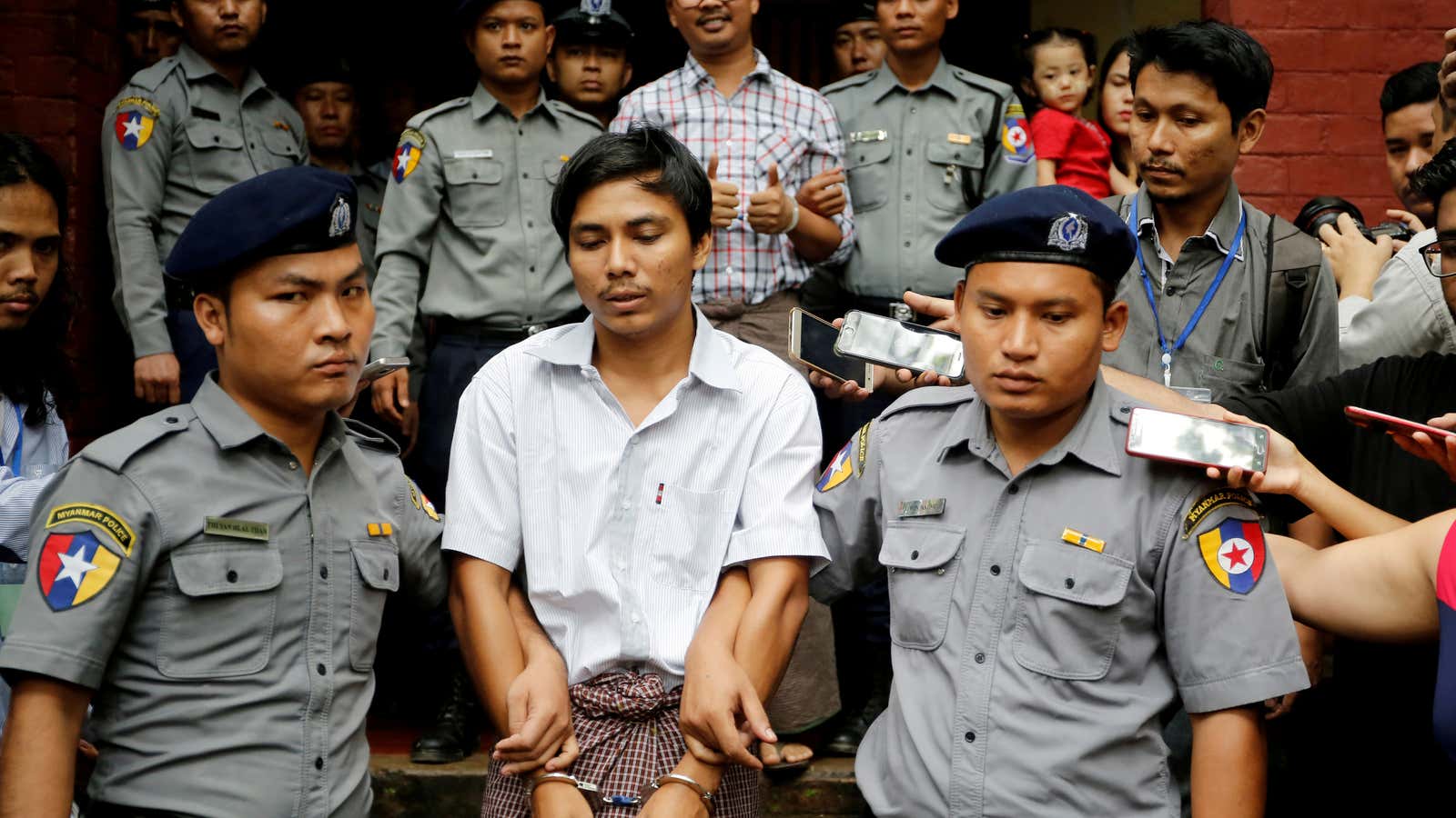 Reuters journalists Kyaw Soe Oo, and Wa Lone, behind, in August 2018.