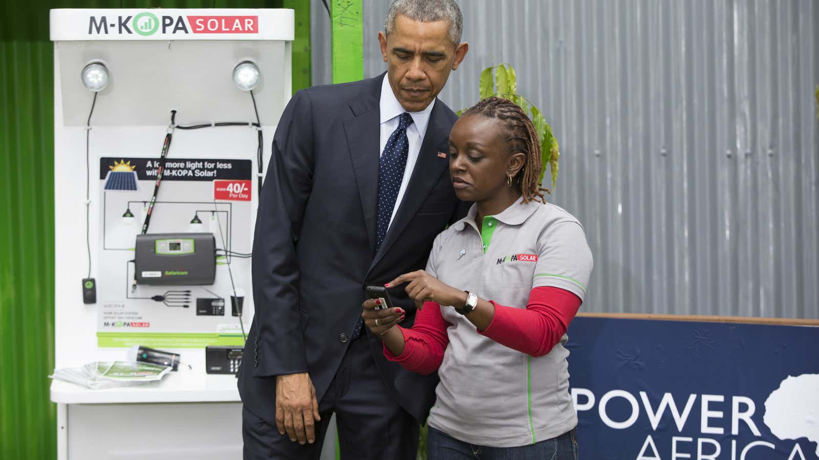 US president  Barack Obama is shown the M-Kopa technology  during his July visit to Kenya.