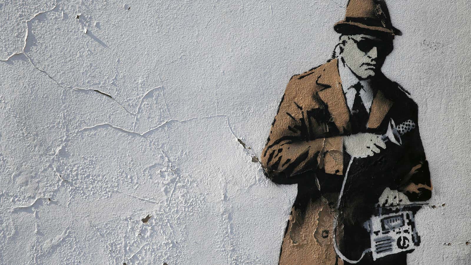 A detail from graffiti art is seen on a wall near the headquarters of Britain’s eavesdropping agency, Government Communications Headquarters, known as GCHQ, in Cheltenham,…