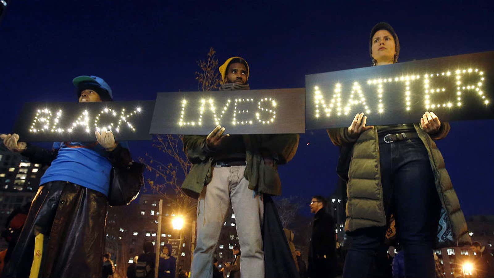 A lit-up sign was the centerpiece of the protest at Foley Square.