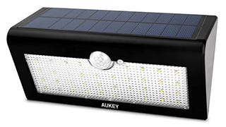 AUKEY Solar Lights Outdoor, 36 LEDs Wall Mounted Security...