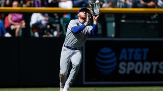 Chicago White Sox outfielder Clint Frazier can't make the catch on