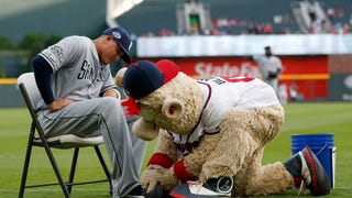 Does Blooper have health insurance? I am effing dying - Atlanta Braves  fans impressed by mascot Blooper going through tables to fire up the crowd