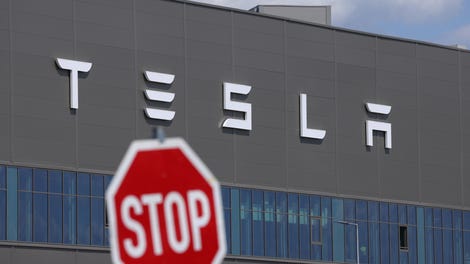 Image for Tesla earnings show plunging revenue as Elon Musk's EV maker warns of hits from Trump's tariffs
