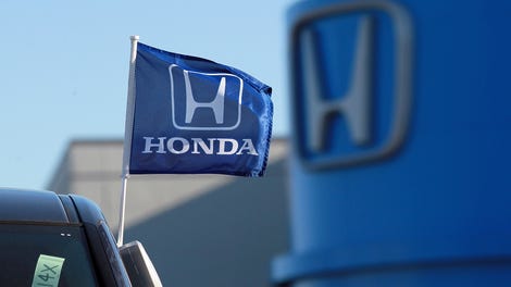 Image for The auto industry is scaling back