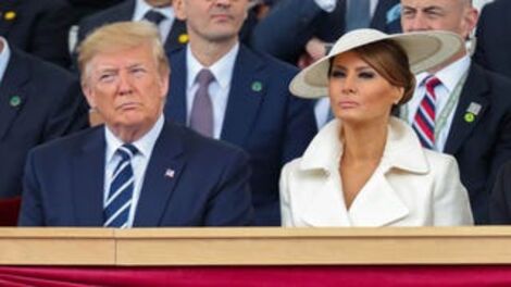 Melania Wears a Plate on Her Head