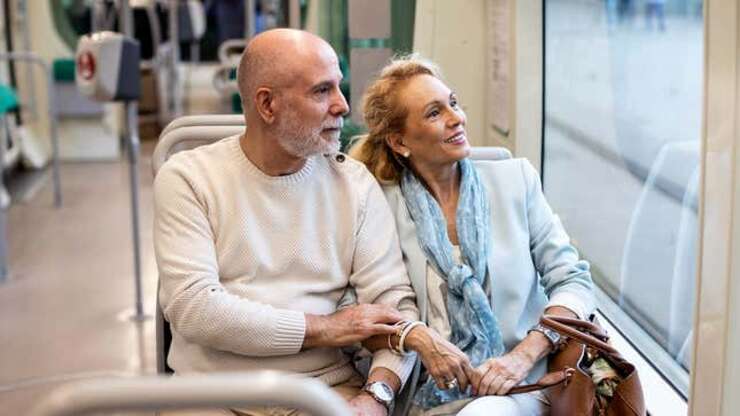 Image for Rude Train Passenger Taking Up Extra Seat With Husband That Could Easily Fit On Lap