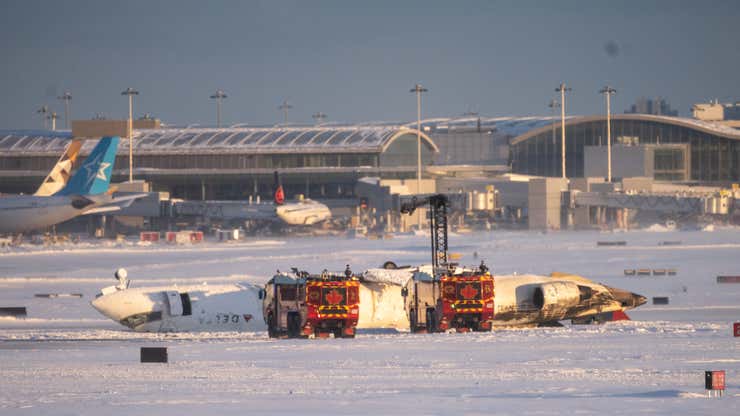 Image for A Delta plane crashed and flipped upside down in Toronto. Here's what to know