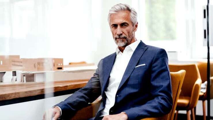 Image for Man In Impeccably Tailored Suit Urges Americans To Invest In Stock Market