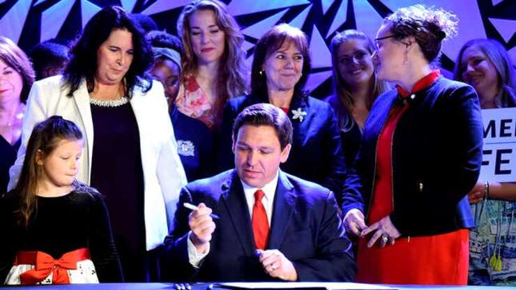 Image for New Florida Law Requires All Women To Produce 3 Healthy White Sons By 22nd Birthday