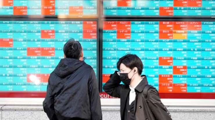 Image for Stock market today: Asia trading mixed after strong US consumer confidence data push Wall St higher