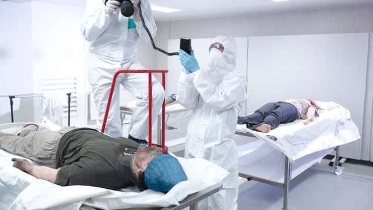 Image for Corpses At Hospital Morgue All Given Either Little Pink Or Blue Hats