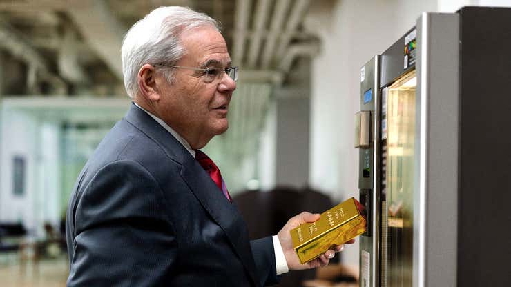 Image for Bob Menendez Repeatedly Tries To Jam Gold Bar Into Courthouse Vending Machine