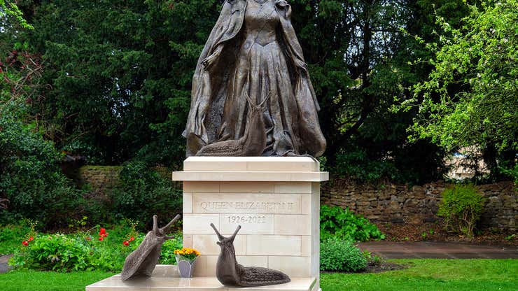 Image for British Sculptor Unveils Memorial Statue Of Queen Elizabeth Surrounded By Her Beloved Slugs