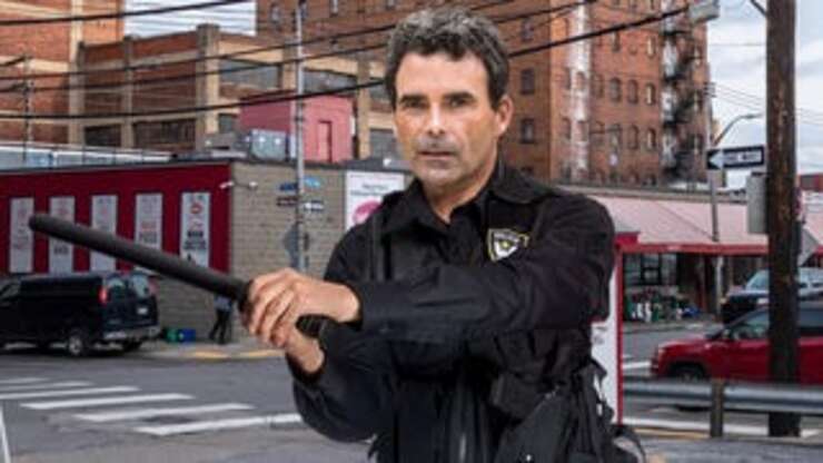 Image for Cop Holding Baton Like He A Jedi