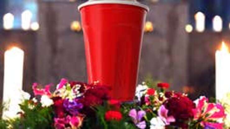 Image for Toby Keith's Remains Solemnly Placed In Red Solo Urn