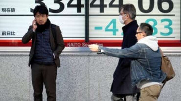 Image for Stock market today: Asian shares slip after Wall Street ends its best month of '23 with big gains