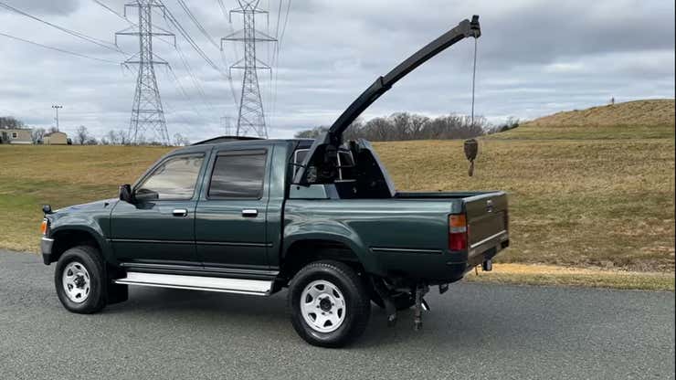 Image for Toyota Hilux With A Friggin' Factory Option Bed-Mounted Folding Crane Is For Sale On Marketplace