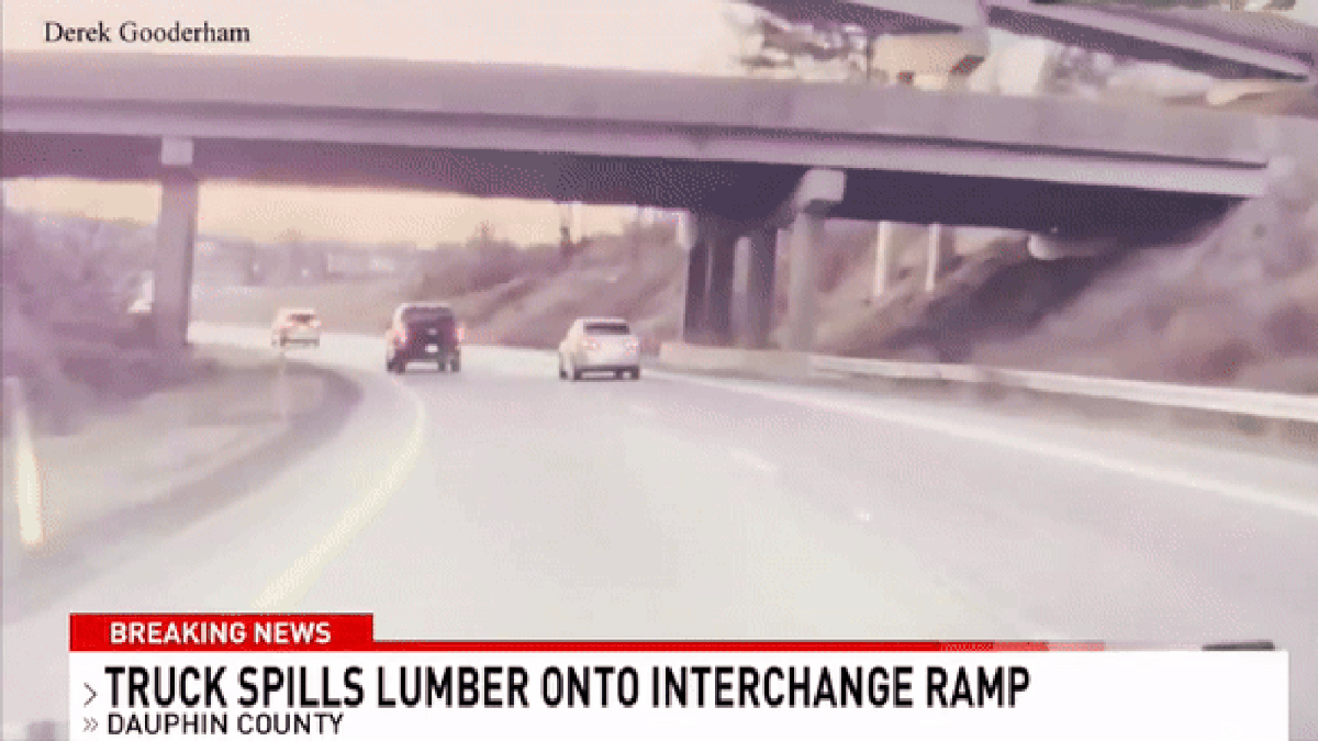 Truck Spills Lumber in Highway ‘Avalanche,’ Taking Out Car And Unlocking New Fear