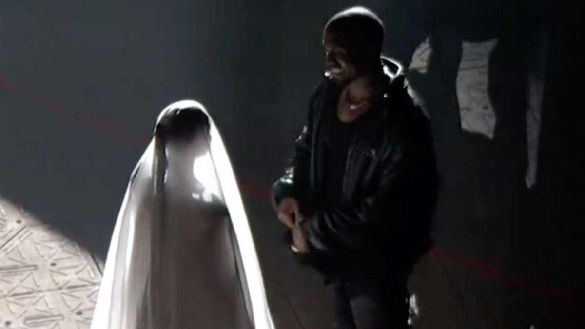 Kanye and Kim Seemingly Reenact Wedding at Chicago 'Donda' Event