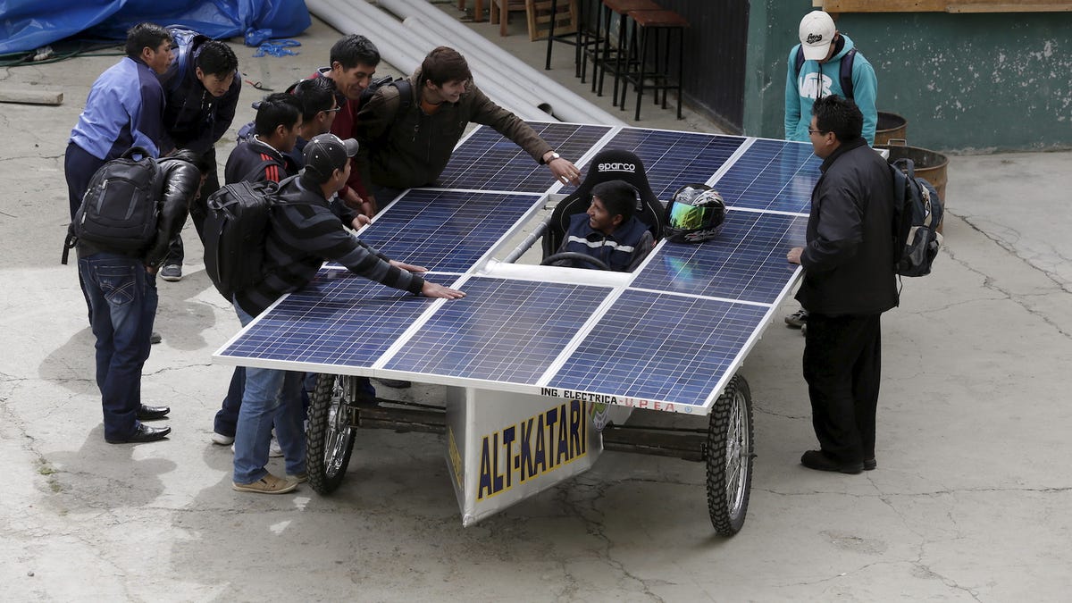 Tesla solar store panel roof car