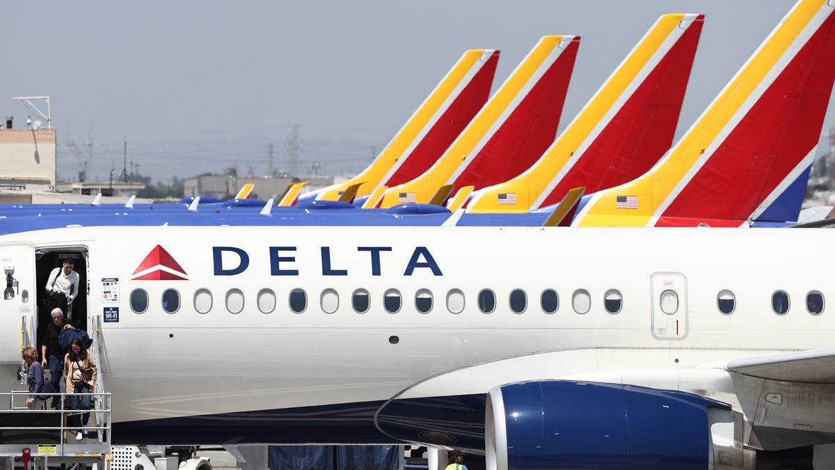 Delta says domestic travel demand is softening, hitting airline stocks