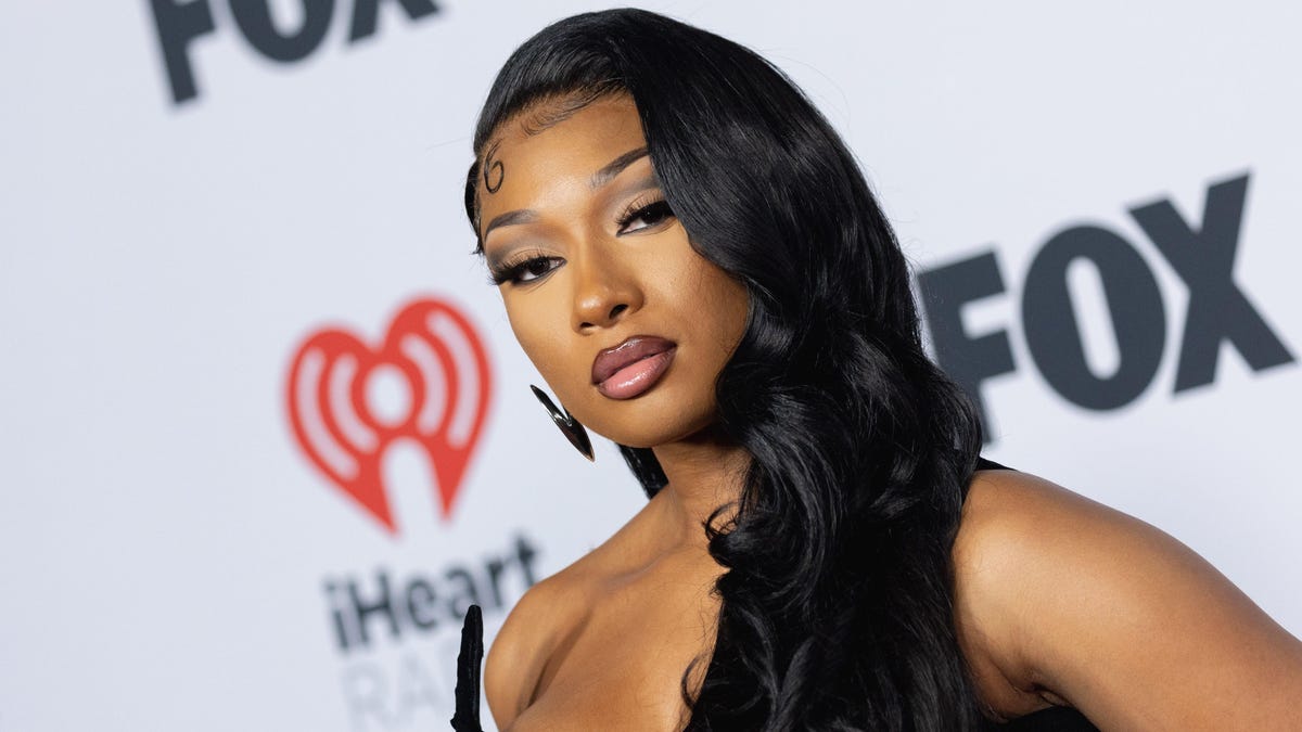 Megan Thee Stallion & Carl Crawford Feud Over Her Upcoming Album