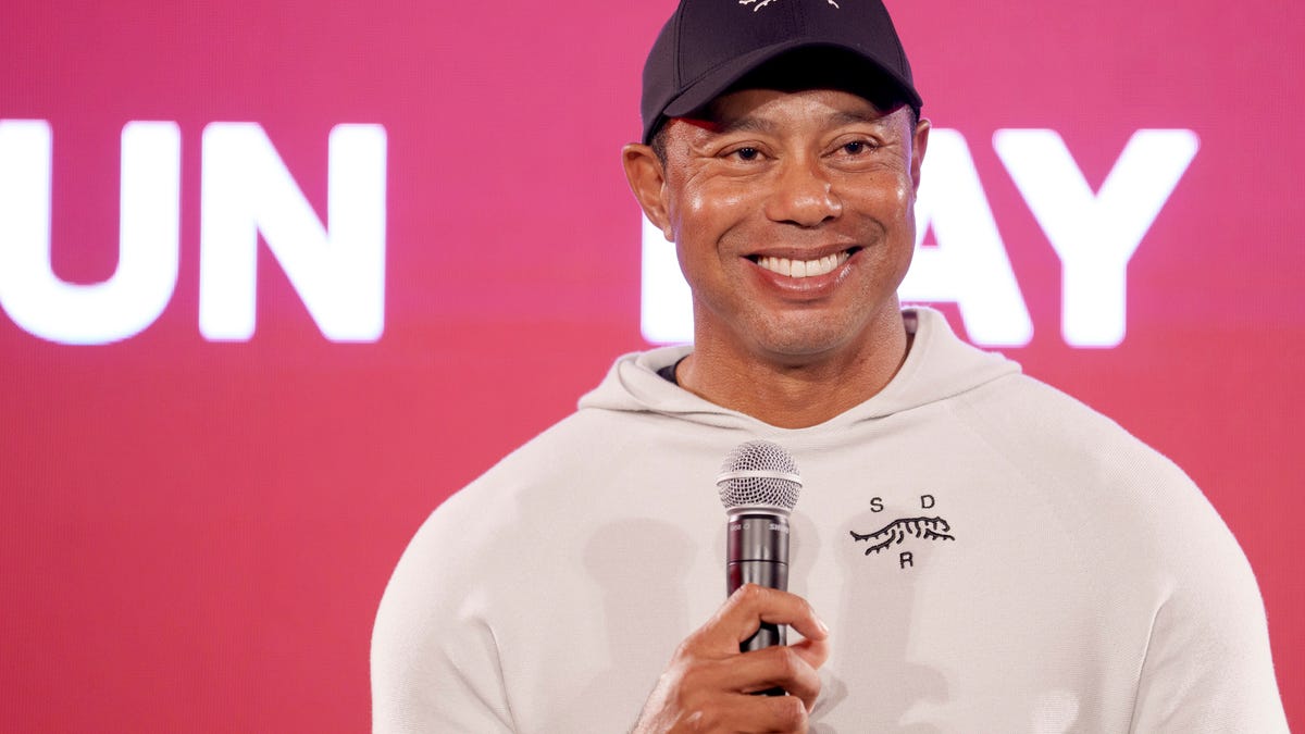 Tiger Woods starts a new year with a new look. Sun Day Red is his new ...