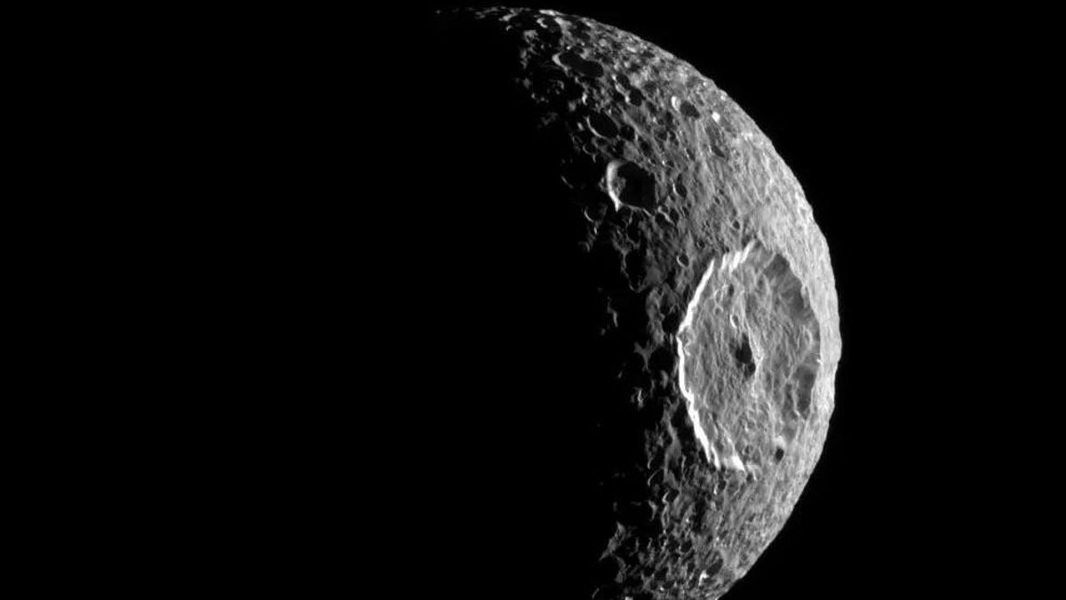 Saturn’s “Death Star” moon hides an ocean beneath its distorted surface