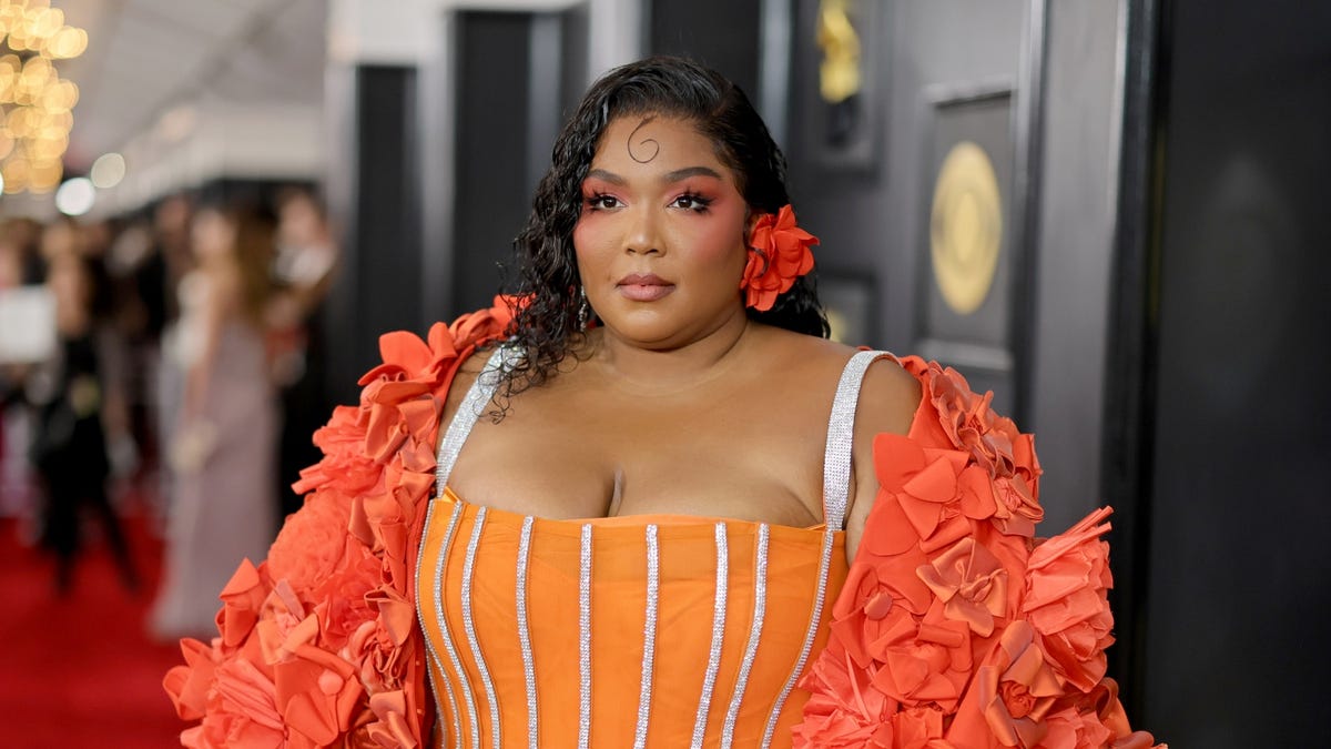 Lizzo Revealed What Was In Extremely Small AMAs Purse | body+soul