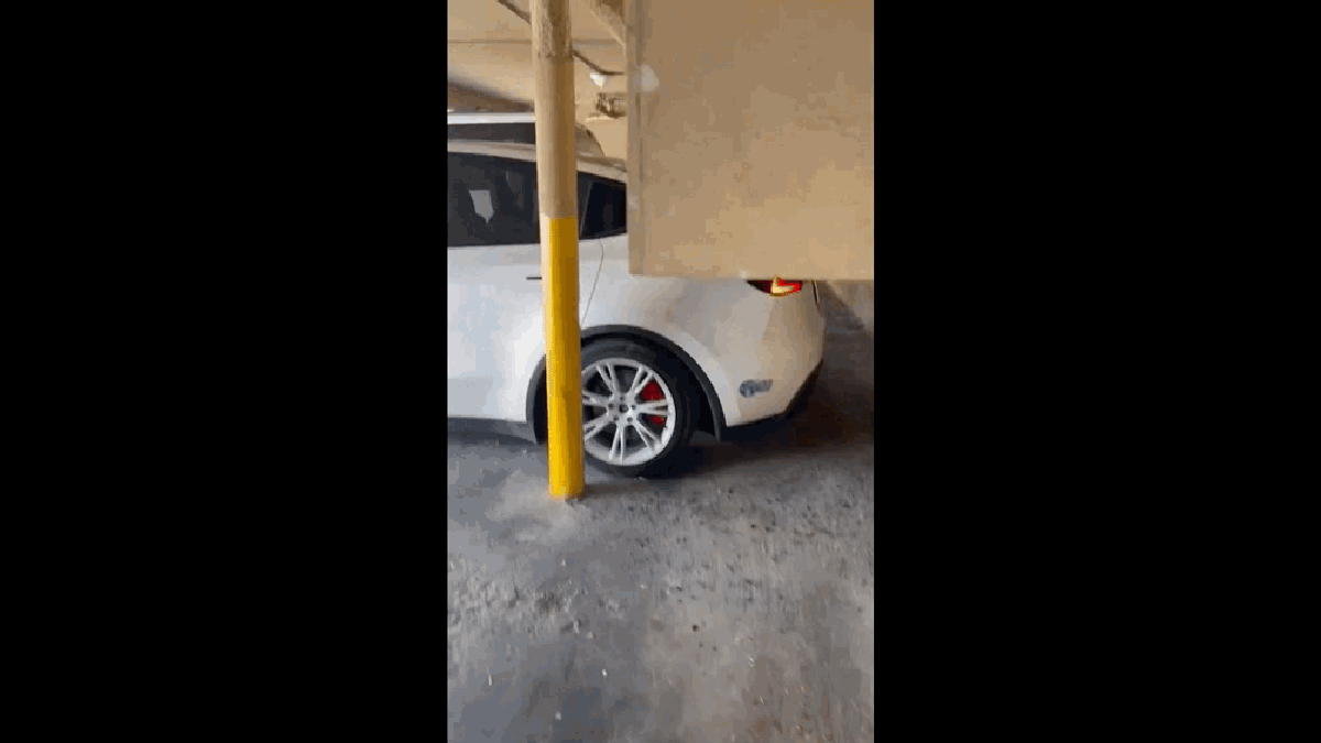 Tesla Model Y Damages Itself While Remotely Backing Into A Parking Space