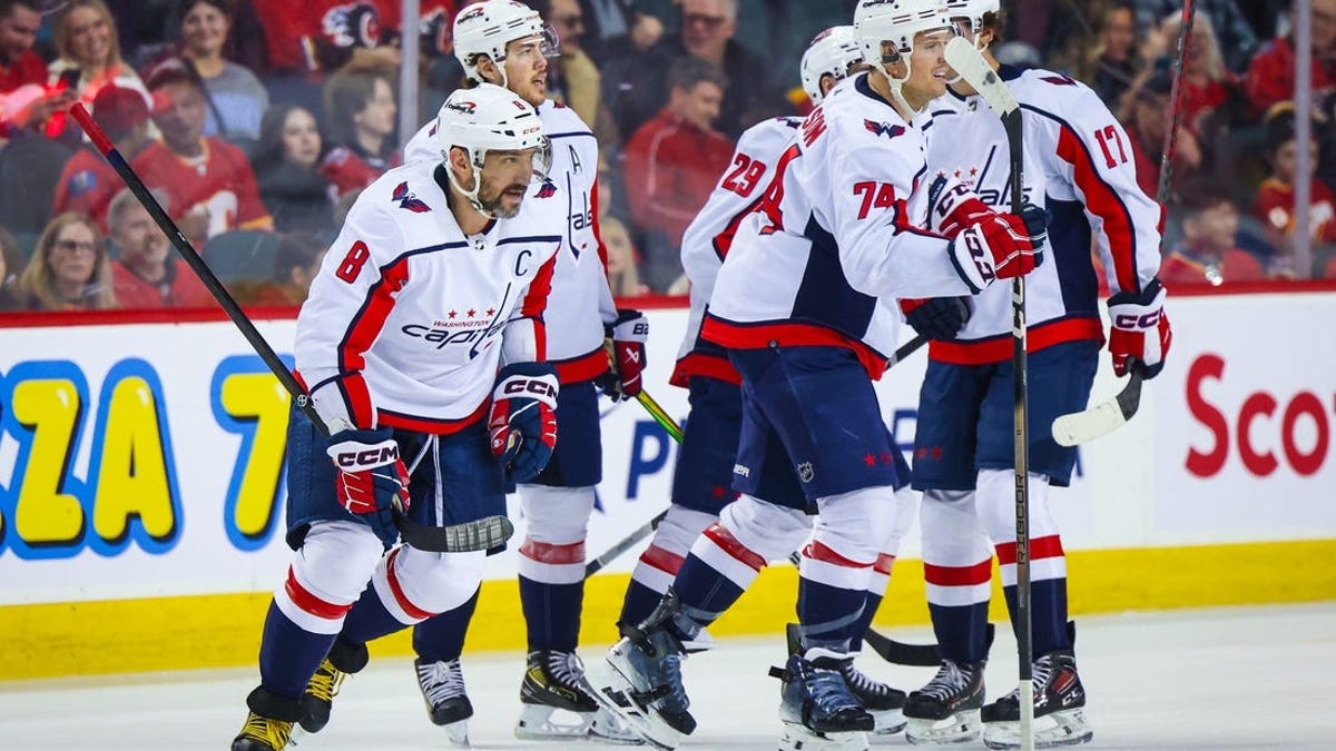 Alex Ovechkin nets pair to reach milestone as Capitals douse Flames