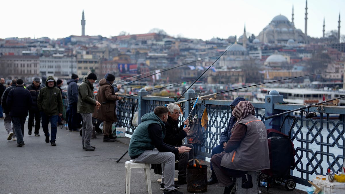 Turkish central bank keeps its key interest rate unchanged, pausing a series of hikes