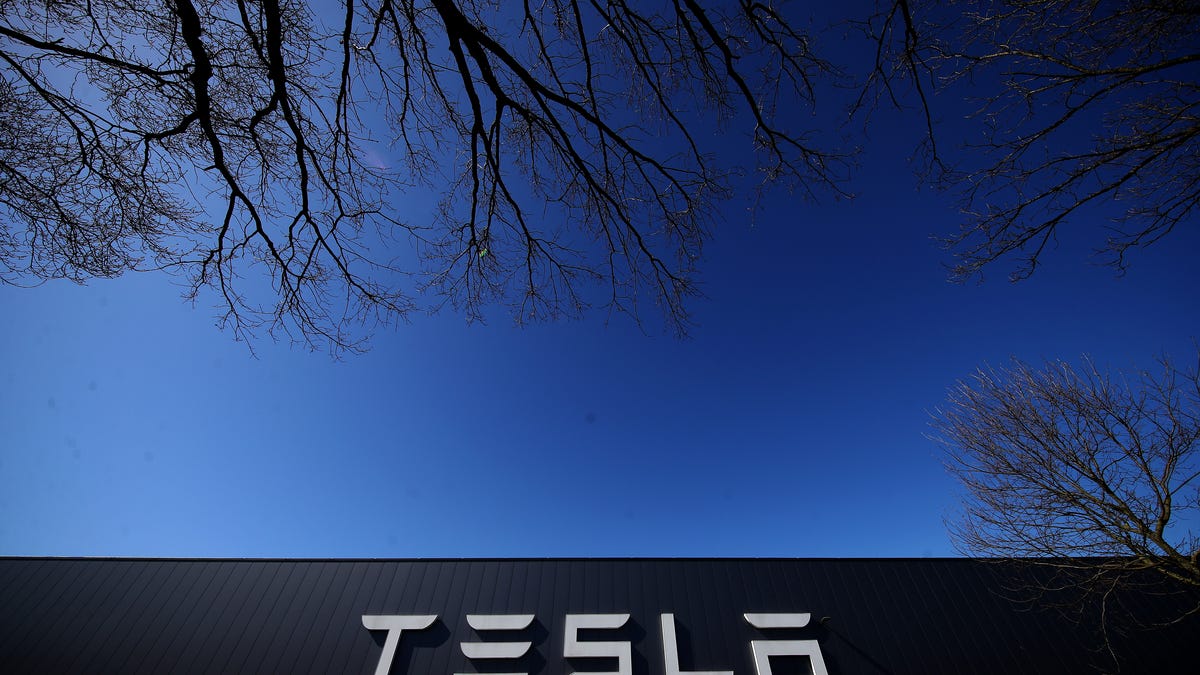 Tesla stock slides after mass layoffs as its market cap falls below $500 billion